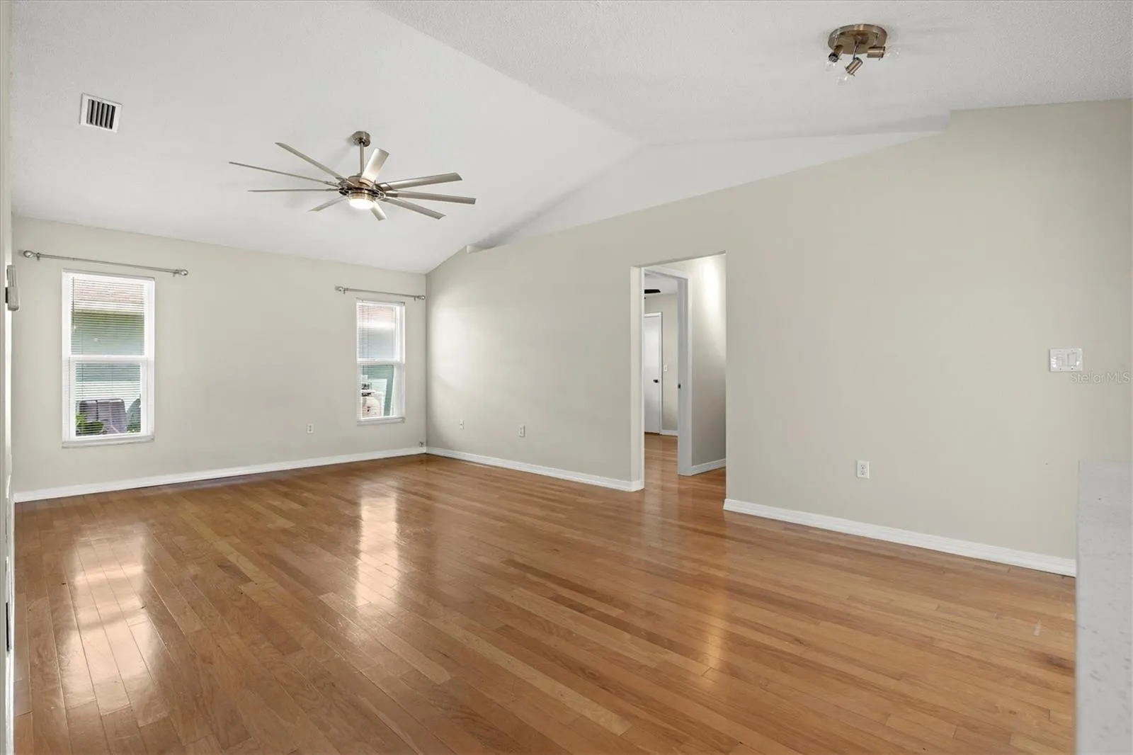 Family room with vaulted ceiling