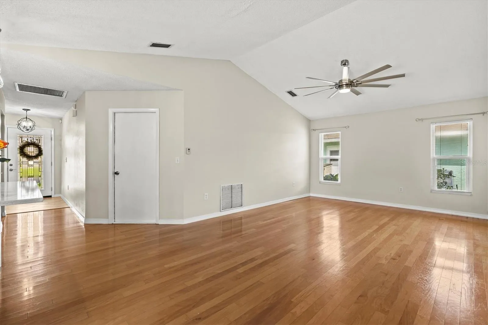 Family room with vaulted ceiling