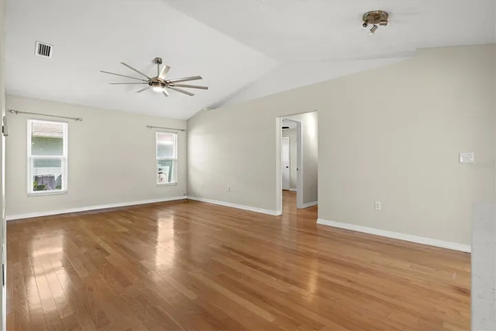 Family room with vaulted ceiling