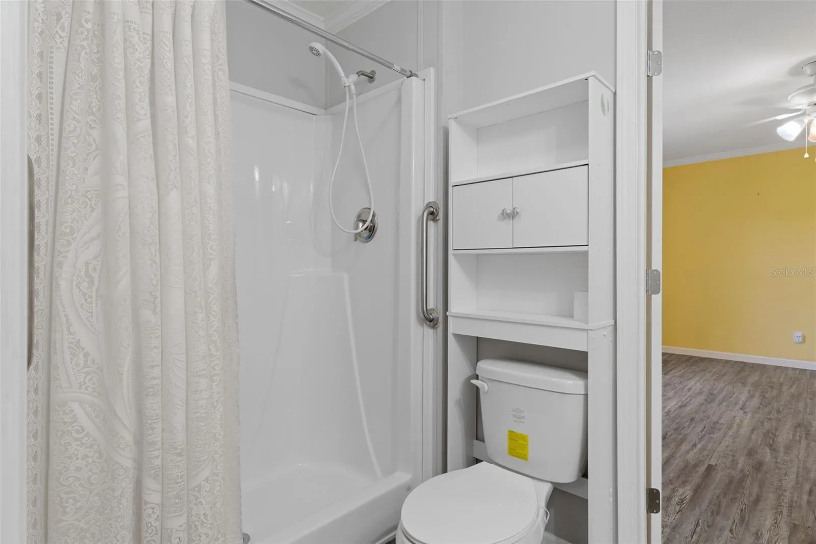Jack-in-Jill bath provides convenient access between the secondary bedroom spaces.