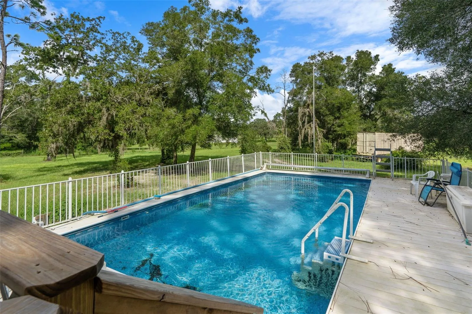 Unaltered view of the 16’x32’ pool and surrounding area.