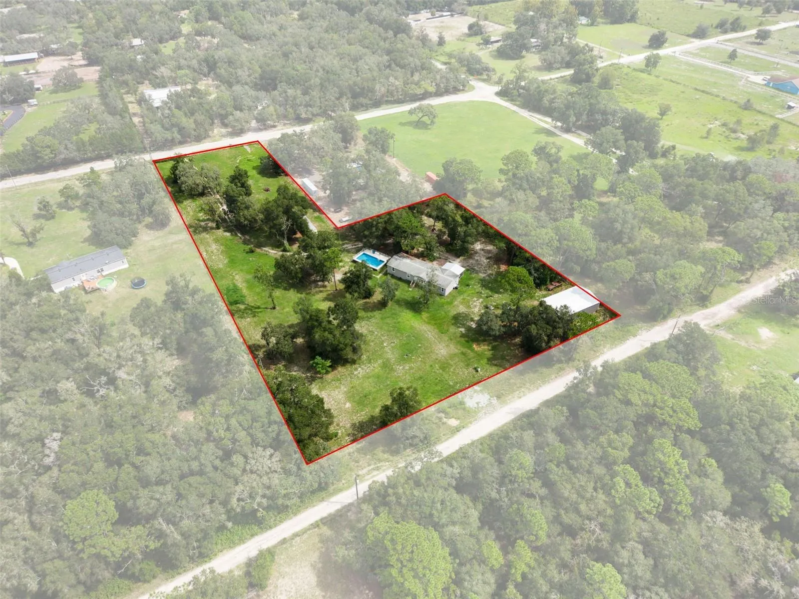 Aerial image with approximate property boundary shown for reference.  Buyer to verify property boundaries. View from Auburndale looking towards Platinum.