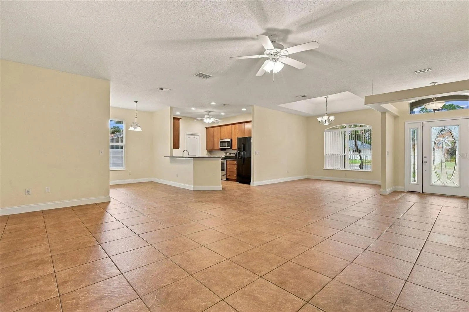 Living Room to Dinette and Kitchen from Primary Bedroom