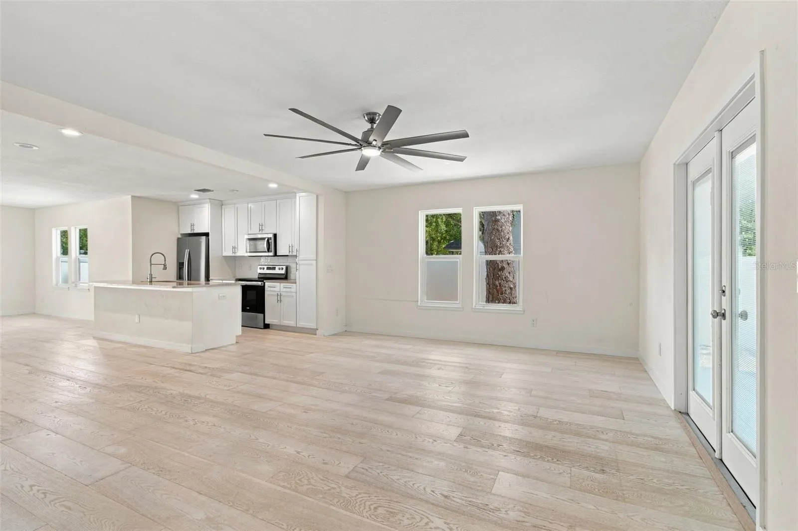 Living room from view of the primary bdrm door