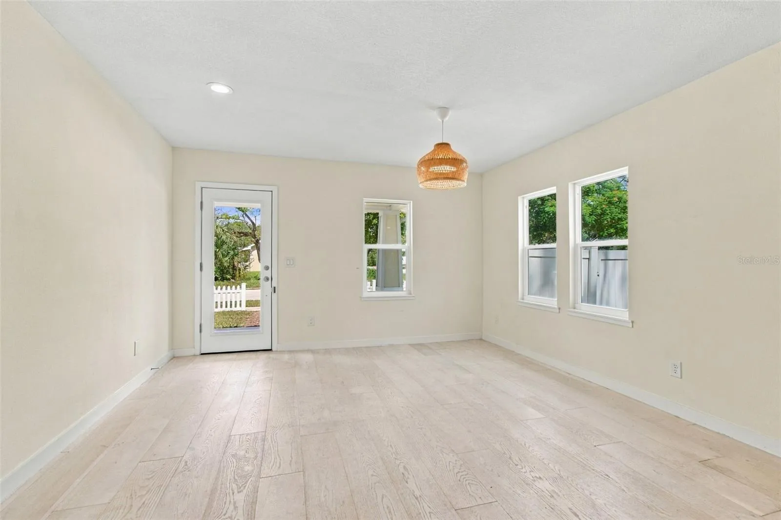Dining room view of front door and window