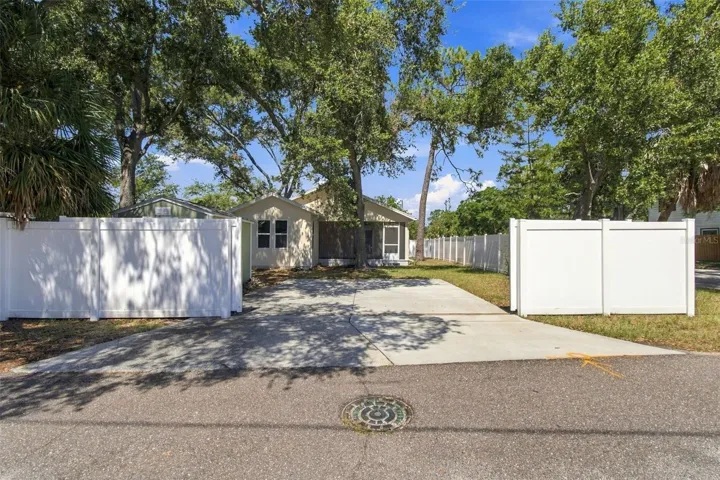 view of the open gate in back of home