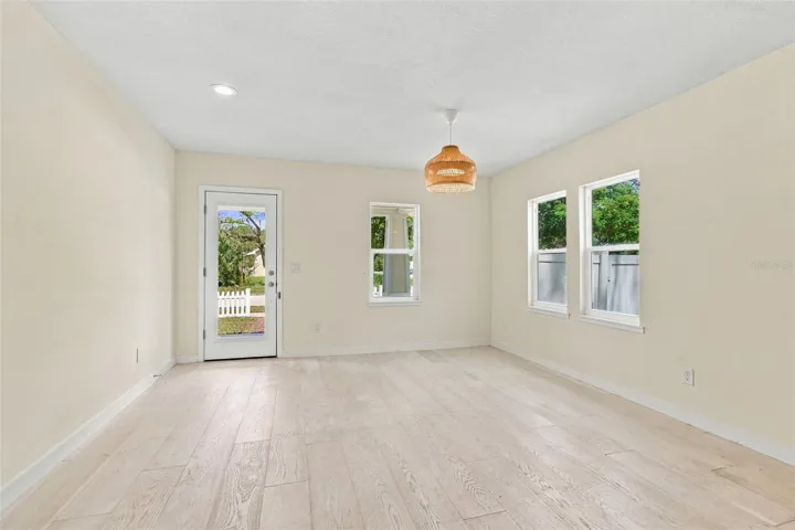 Dining room view of front door and window