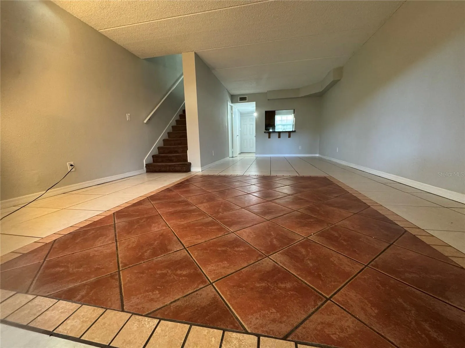 FROM REAR PATIO SLIDERS TO FRONT THRU LOUNGING ROOM/ DINING &amp; TO FOYER &amp; FT DOOR