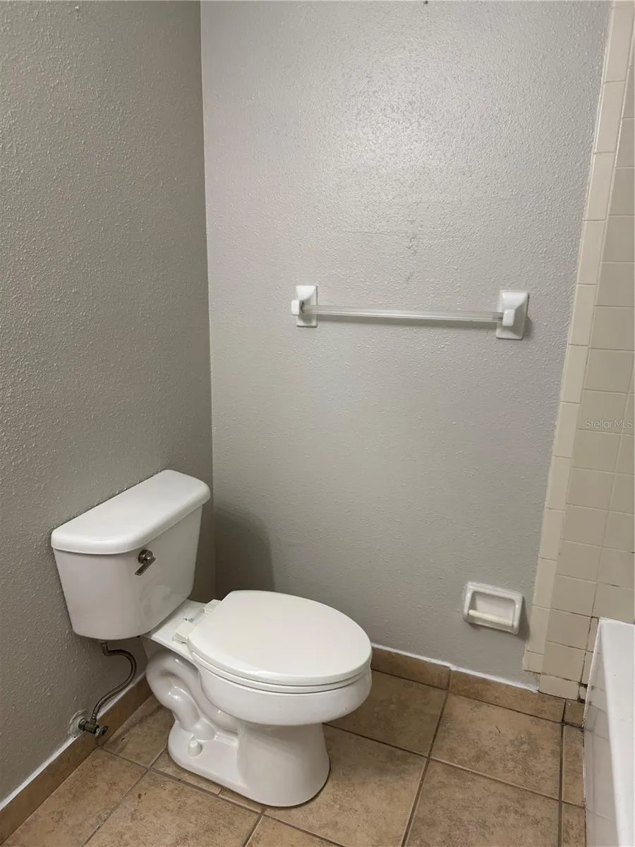 NEWER COMMODE WITH UPDATED SUPPLY LINE
