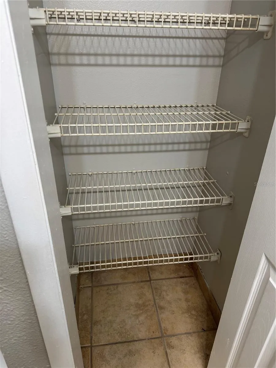 PRIMARY FULL BATH LINEN CLOSET