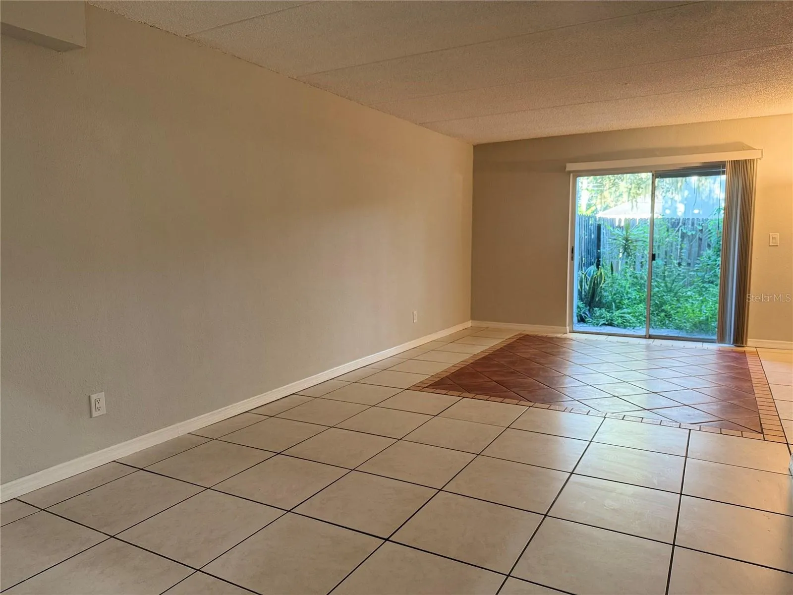FROM FOYER TO 1ST FLOOR REAR PATION &amp; LAUNDRY