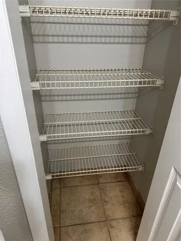 PRIMARY FULL BATH LINEN CLOSET