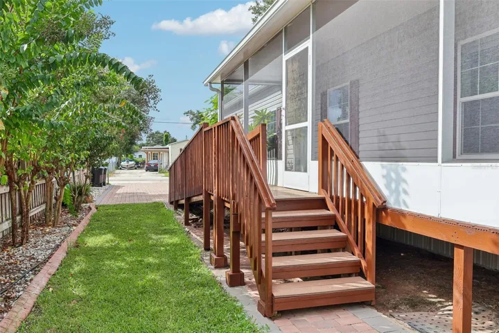 Ramp and stair entrance to the home.