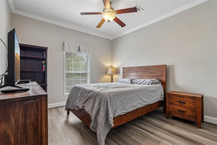 Three additional Bedrooms are located on the opposite end of the home near the second full Bath.  Bedroom 3