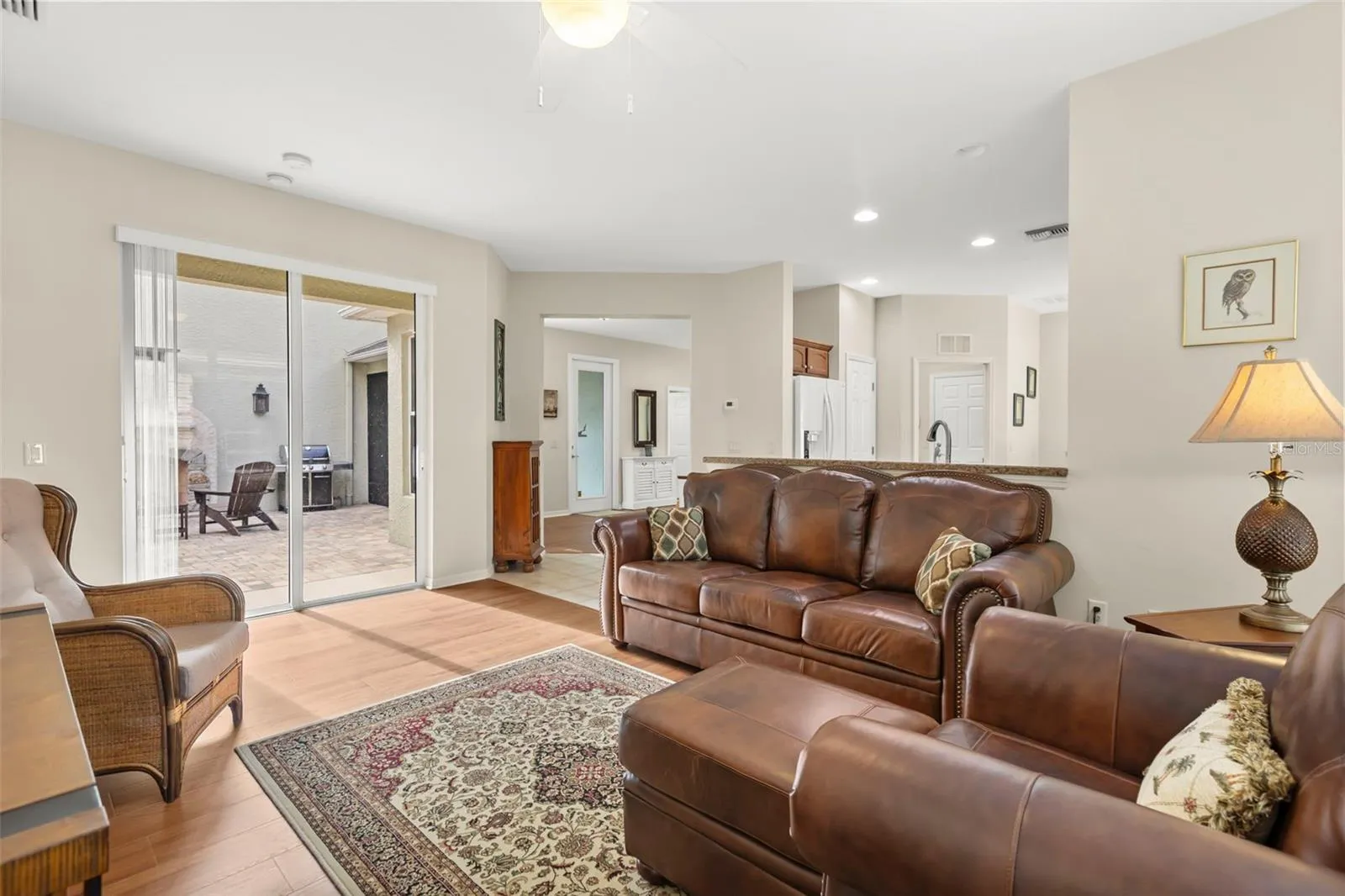 Living Room with Open Flow to Kitchen and Bonus Room