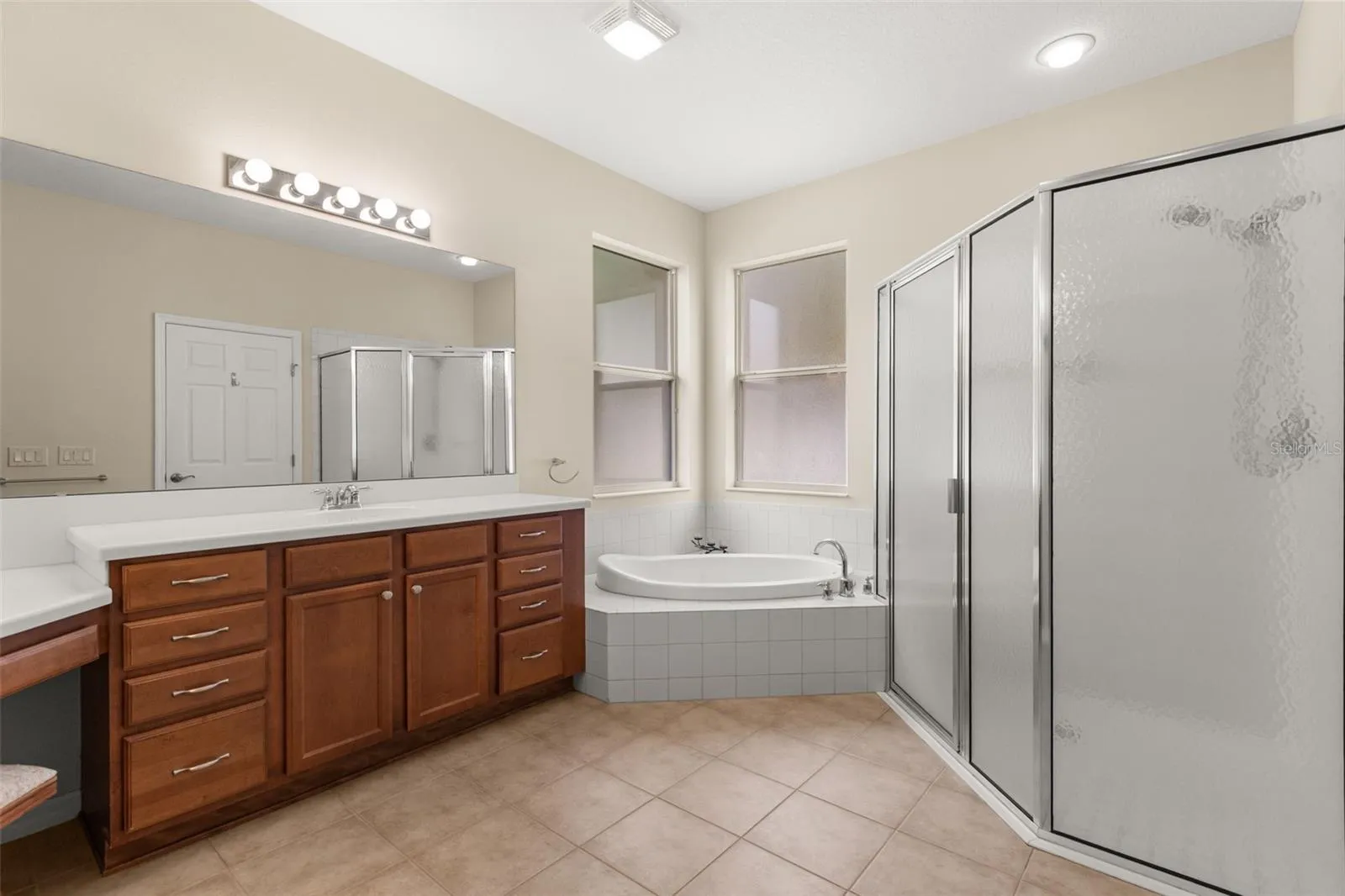 Primary Bathroom with Dual Vanity, Soaking Tub and Separate Shower