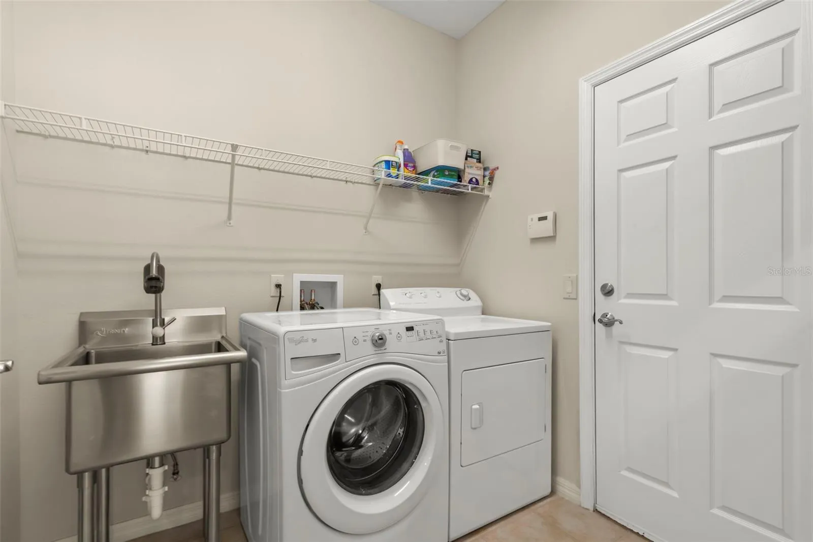 Laundry Room with Utility Sink and Storage