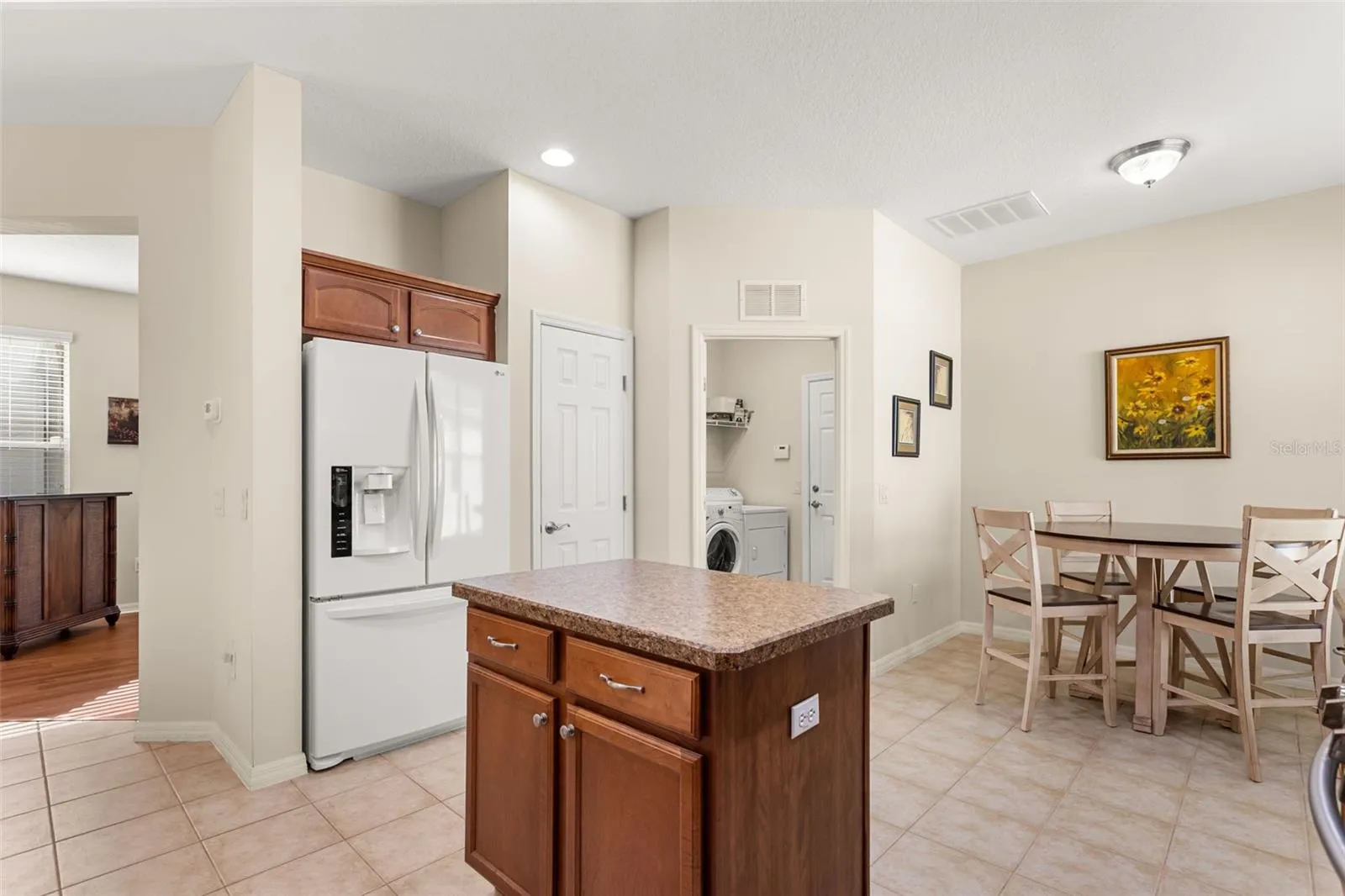 Kitchen with Center Island and Adjacent Dining Area