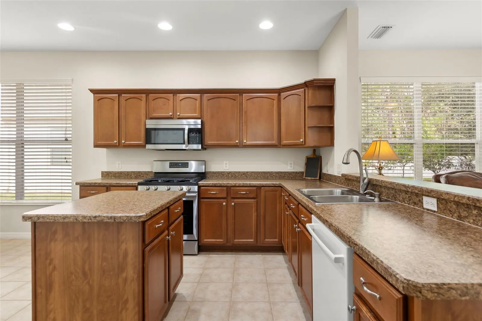 Spacious Kitchen with Center Island and Ample Cabinetry