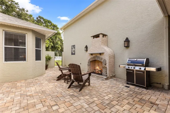 Private Courtyard with Outdoor Gas Fireplace, Paver Patio &amp; 2 Custom Copper Gas Lanterns