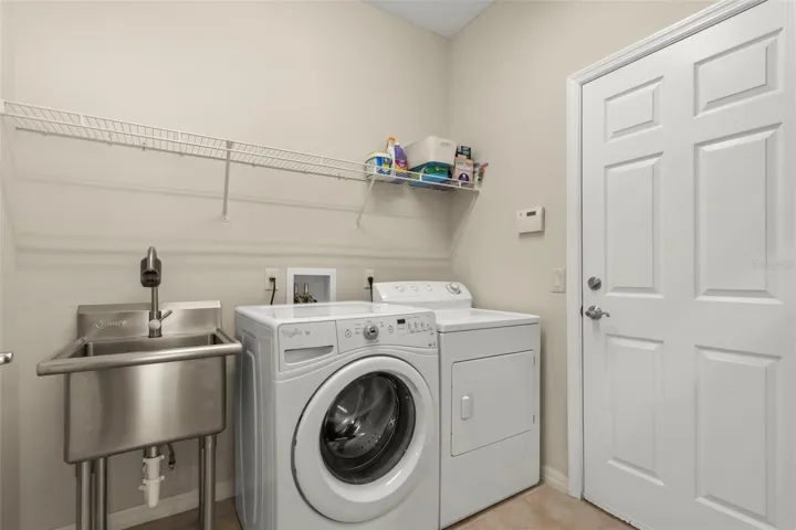 Laundry Room with Utility Sink and Storage