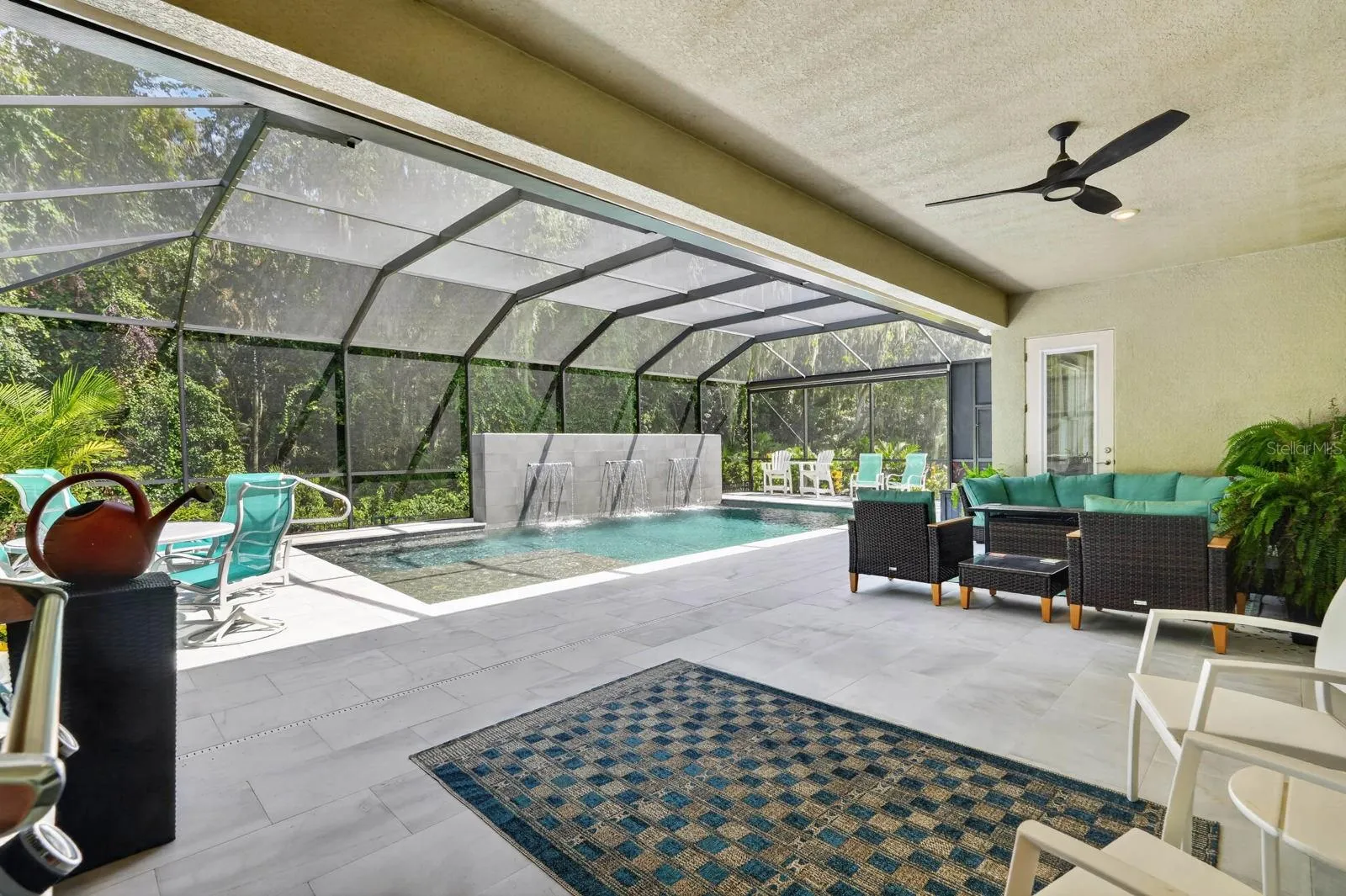 Large covered lanai overlooks stunning pool