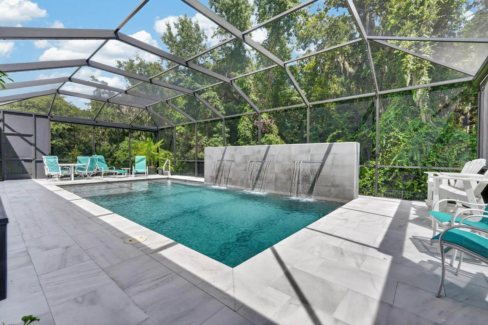 pool surround is a sealed marble surface that stays cool on the feet