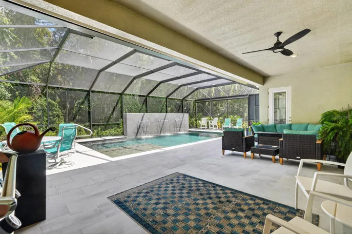 Large covered lanai overlooks stunning pool