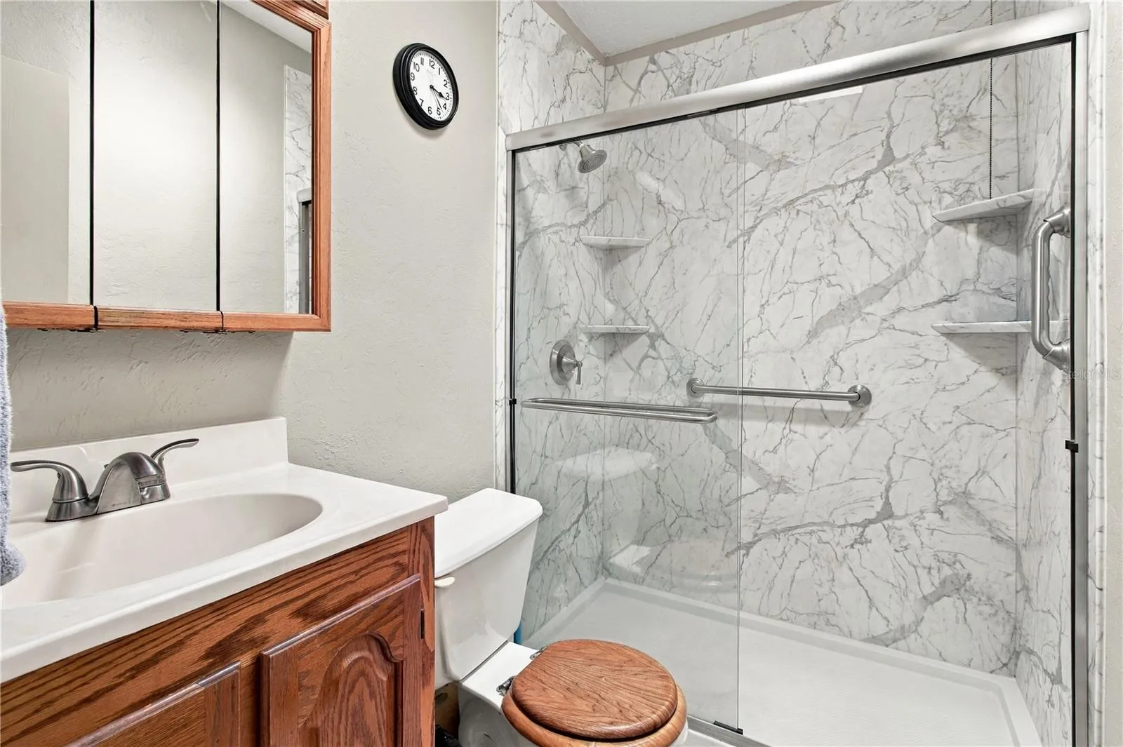 Guest bathroom with updated shower and new custom vanity