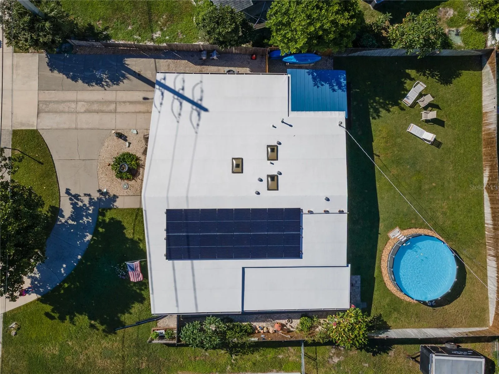 Ariel of home with newer roof and new solar pannels with transferrable warrenty