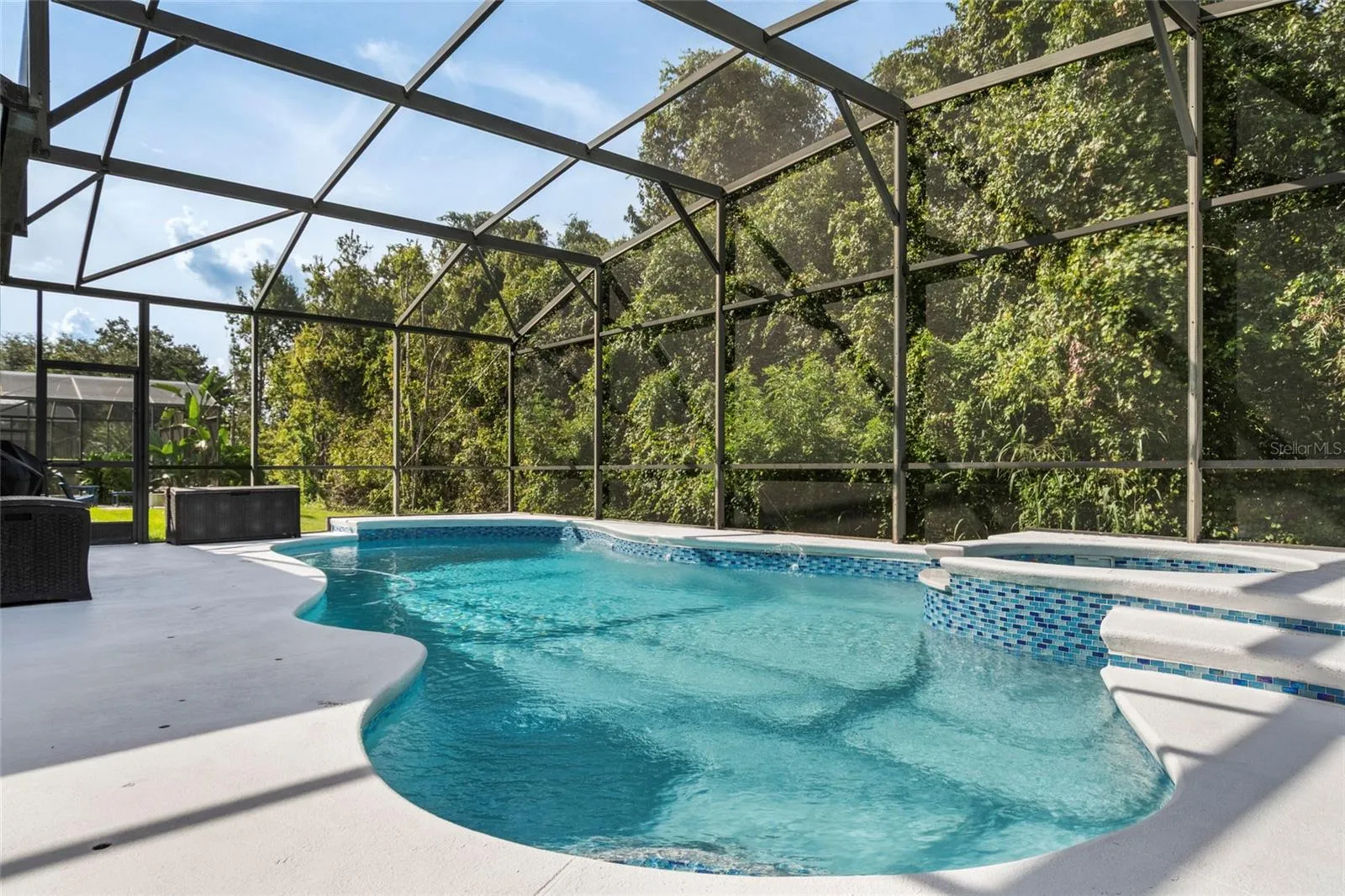 Newly Resurfaced Pool and Spa with water feature.