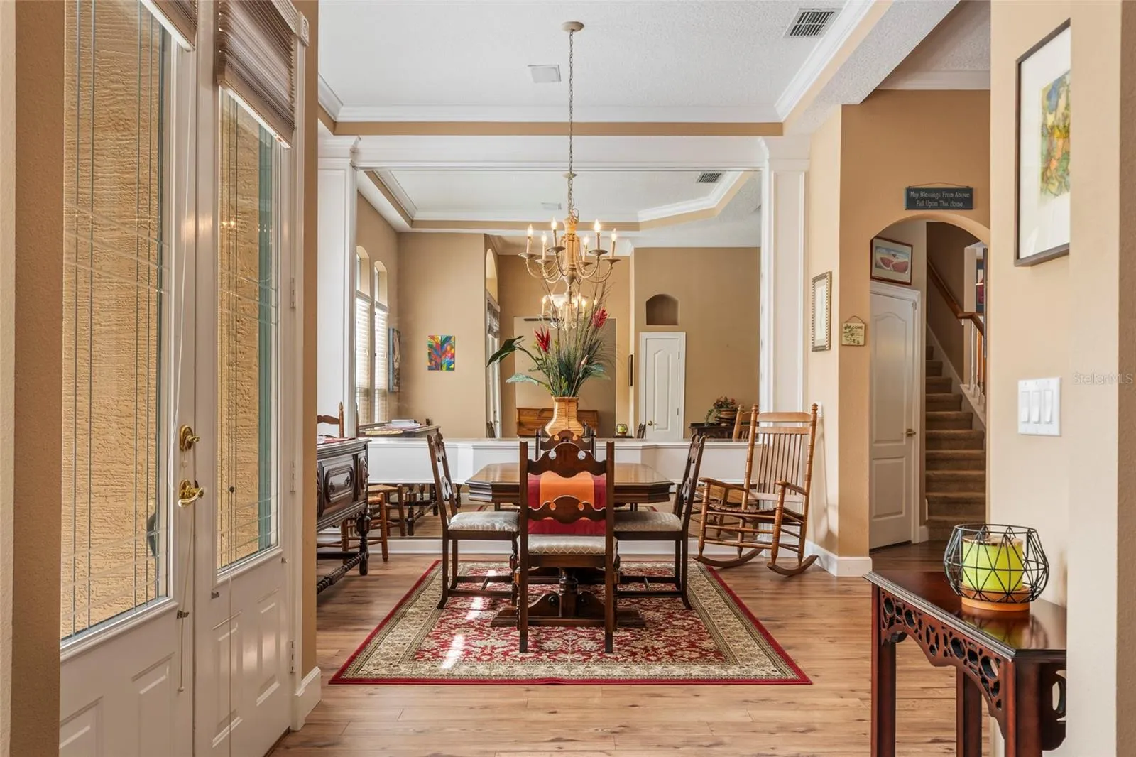 Dining Room with Tray Ceiling and Crown Molding