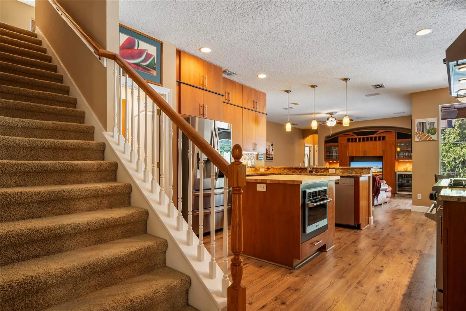 Stairs off Kitchen leading to upstairs Bonus Room