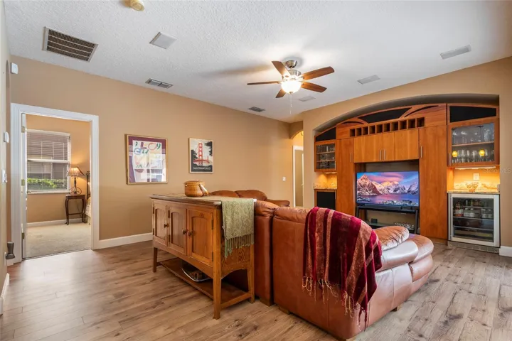 Built In Speakers with access to stereo and theater components upstairs in storage closet
