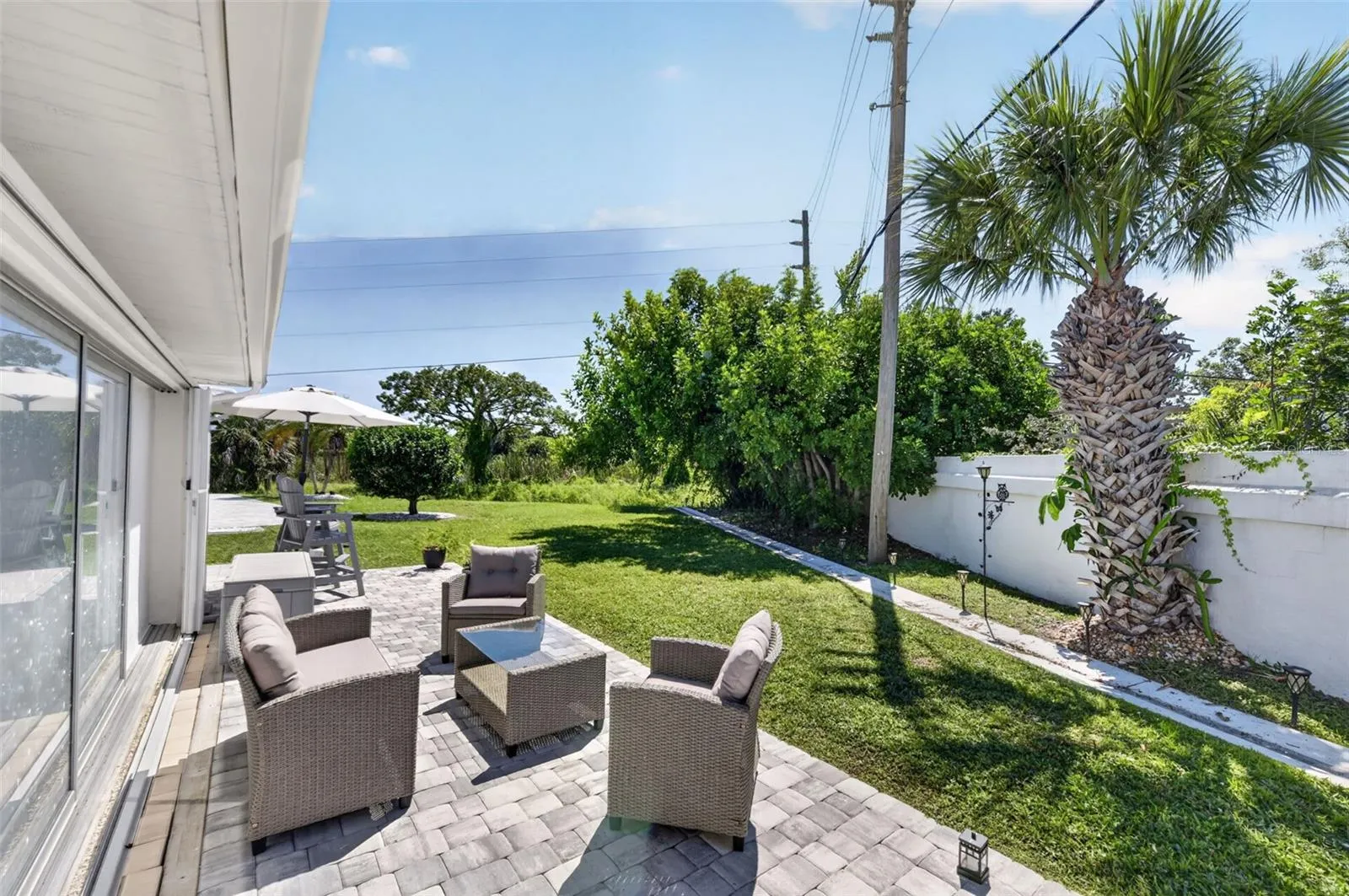 Outdoor patio with view of yard space