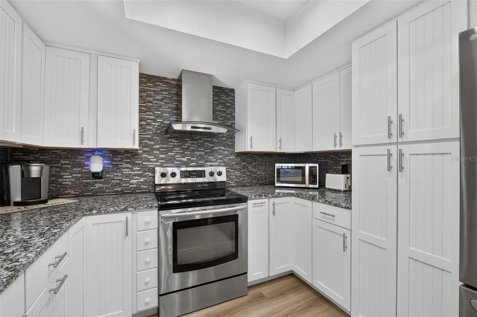 Plenty of cabinet space in this updated kitchen