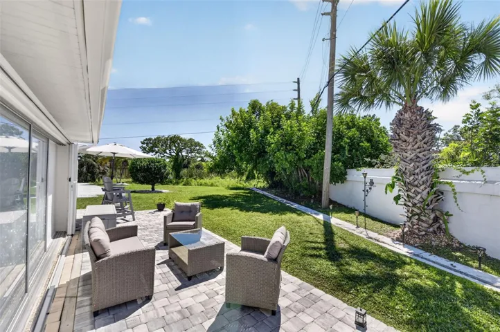 Outdoor patio with view of yard space