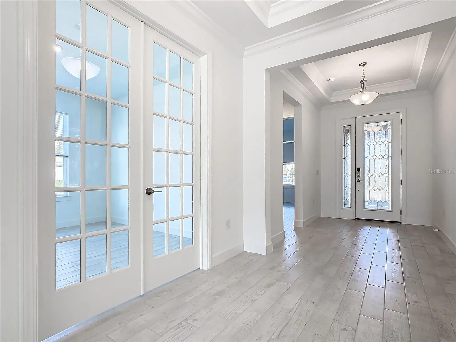 Study/Flex Room has Divided lite French Doors