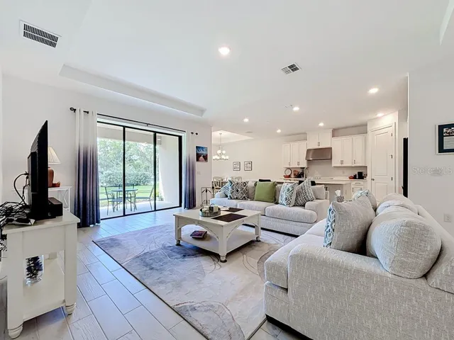 Entrance Hall to Great Room w/15 AMP/110 Volt Floor Outlet w/Brass Cover