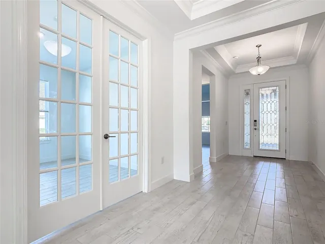 Study/Flex Room has Divided lite French Doors