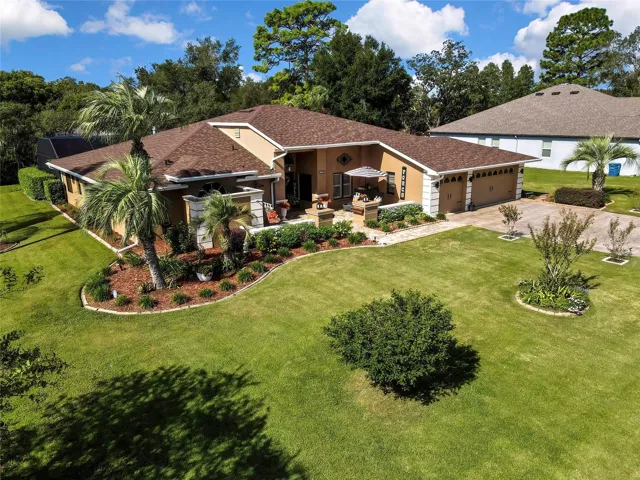 1/2 acre. Landscape is perfection!