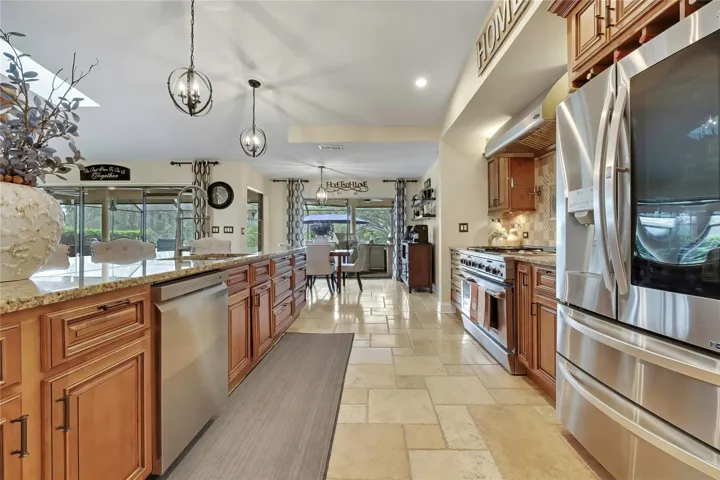 Upscale wood cabinets, granite and newer appliances