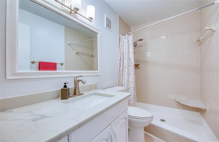 updated shower with bench