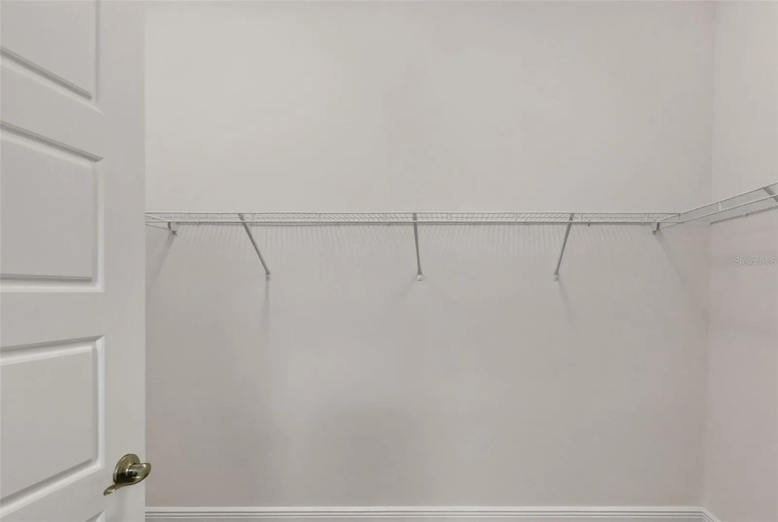 Primary Bedroom Walk-In Closet