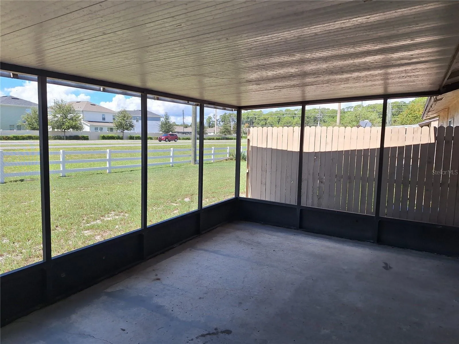 Covered and screened back porch.