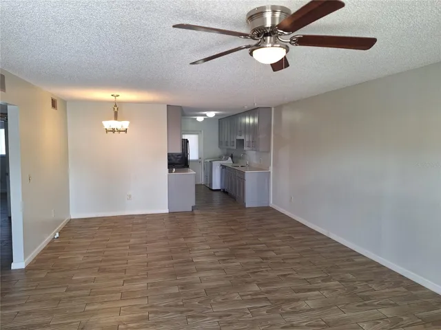 View of the living/dining and kitchen areas from the entrance.