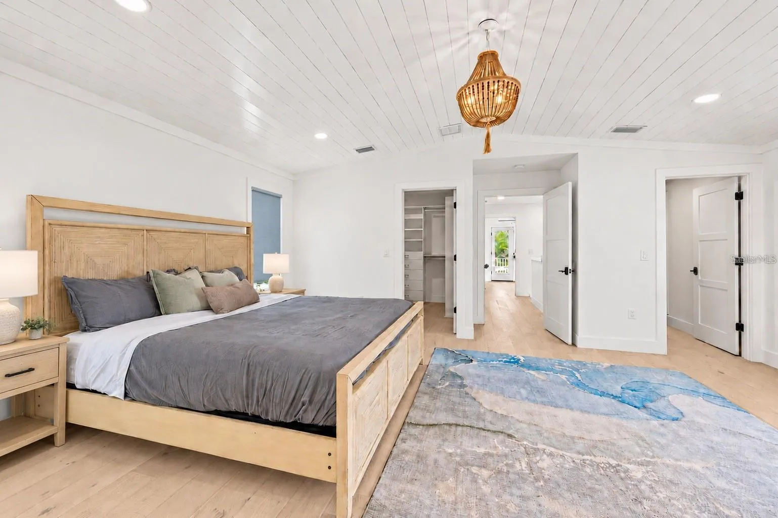 Primary suite with vaulted ceiling