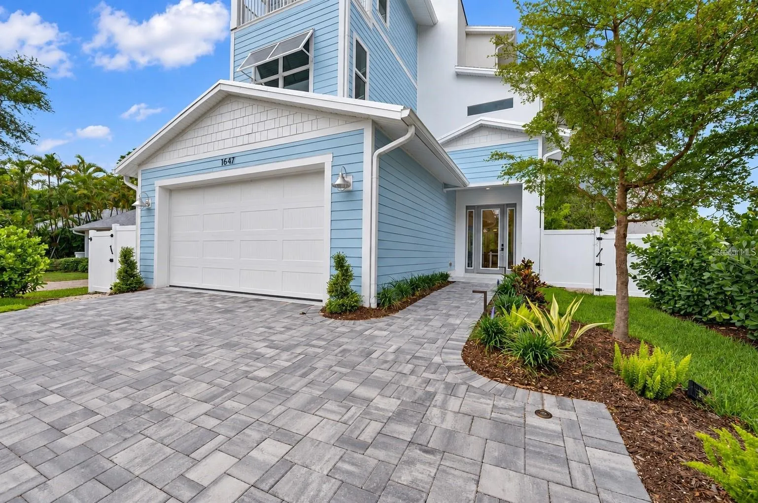 A gate enclosure has since been added for the front door pathway, to create more privacy