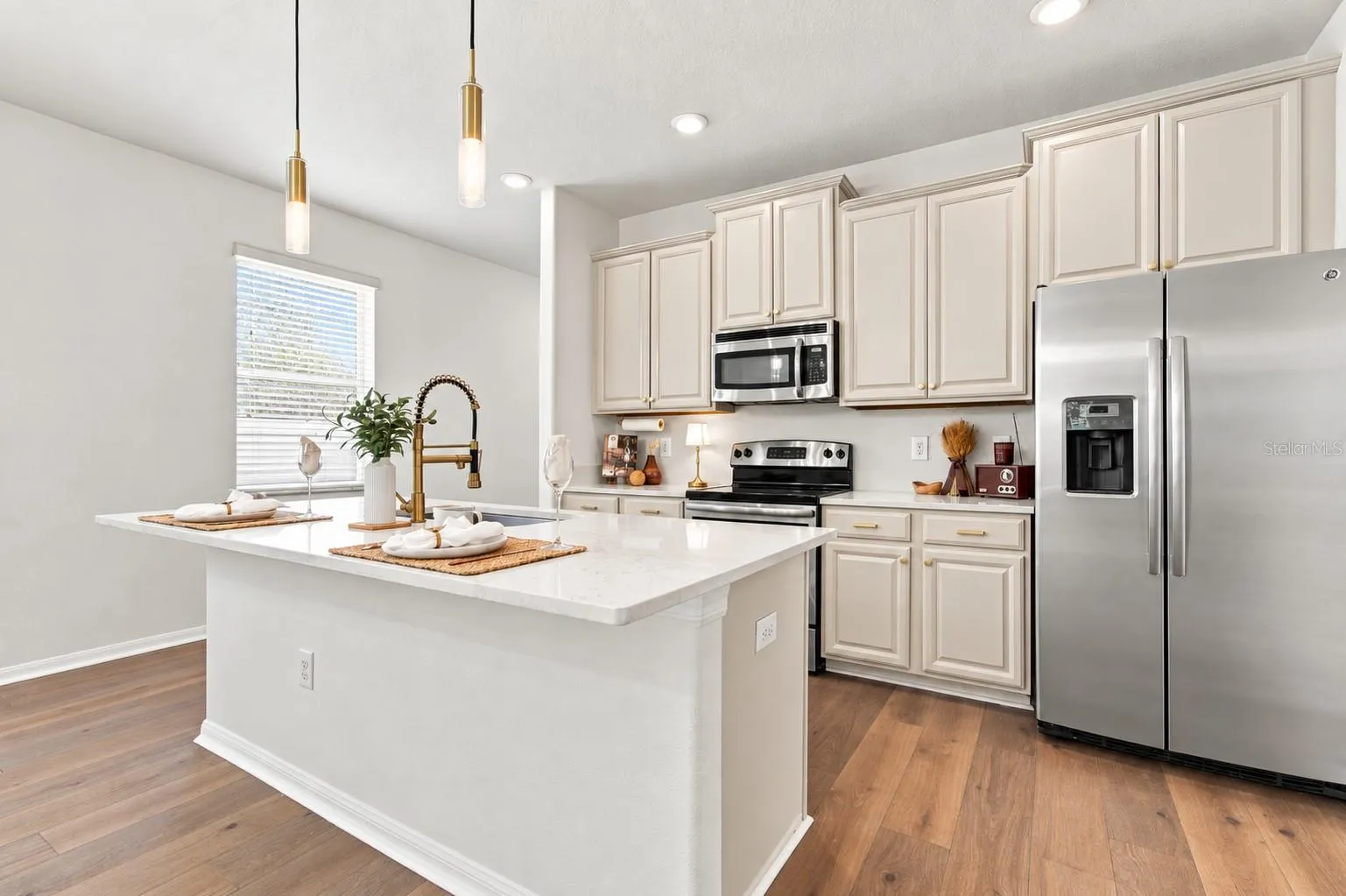 Updated kitchen with quartz island.