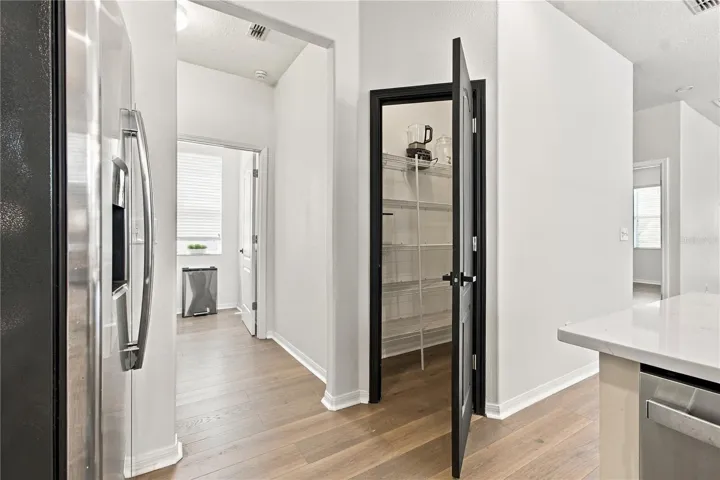 Kitchen Pantry to Laundry Room.